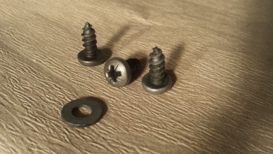 Self-tapping screw after wire brushing